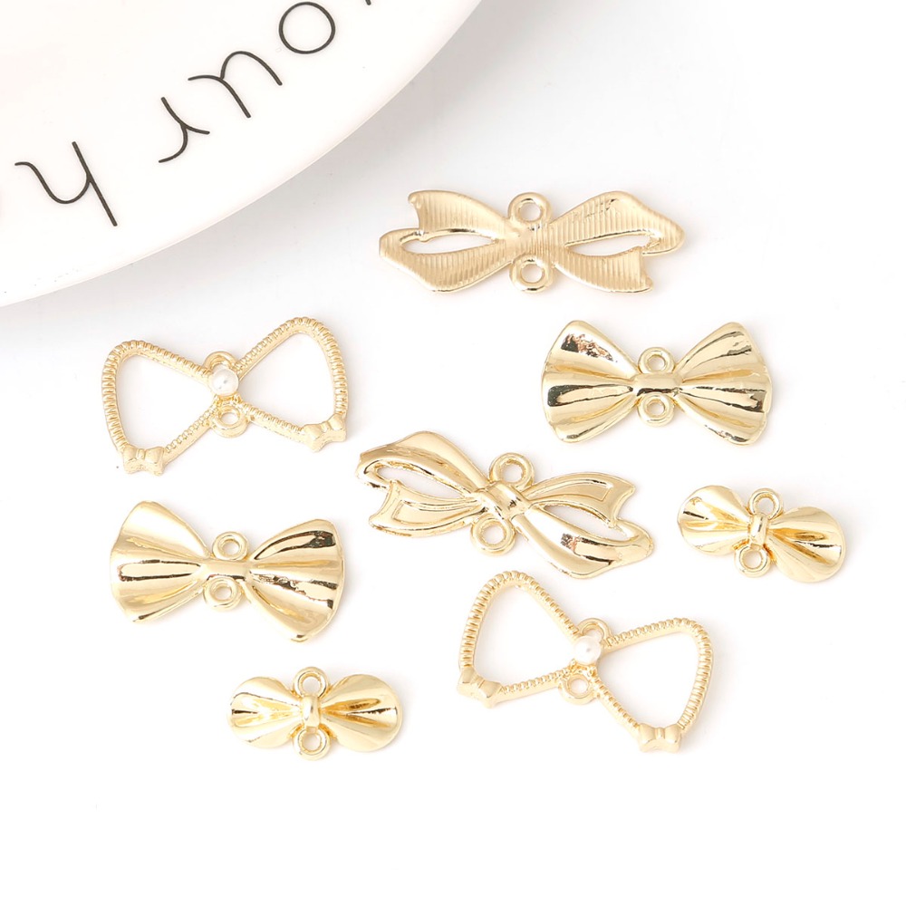 Vintage Antique Gold Bow Charm - Vintage Fashion Nz recension och pris